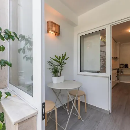 דירה Guestready - Sunny Patio Paradise In